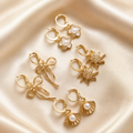 4 Pairs Gold Plated Pearl Stud Earrings Set for Women | Adjustable Brass Hoop Earrings | Floral, Bow, Shell & Sun Charm Earrings | Western Casual Jewelry